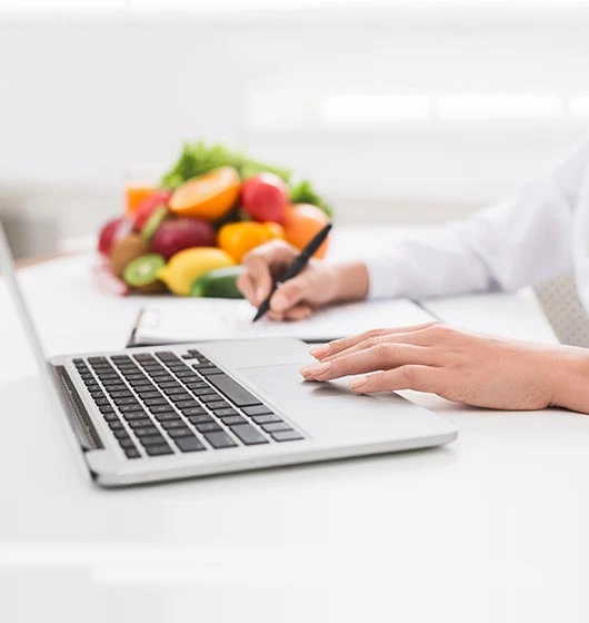 woman making a shopping list